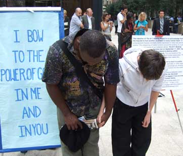 Bowing at Ground Zero in 2007, with a young man who joined me