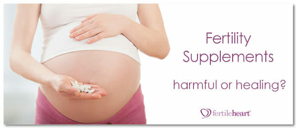 Pregnant Woman with Vitamins Are Fertility Supplements Harmful or Healing