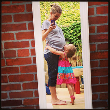 Fertile Heart Pregnant Woman with Small Child