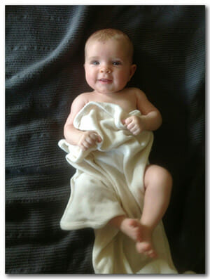 Suzanne's Fertile Heart Baby in White Blanket